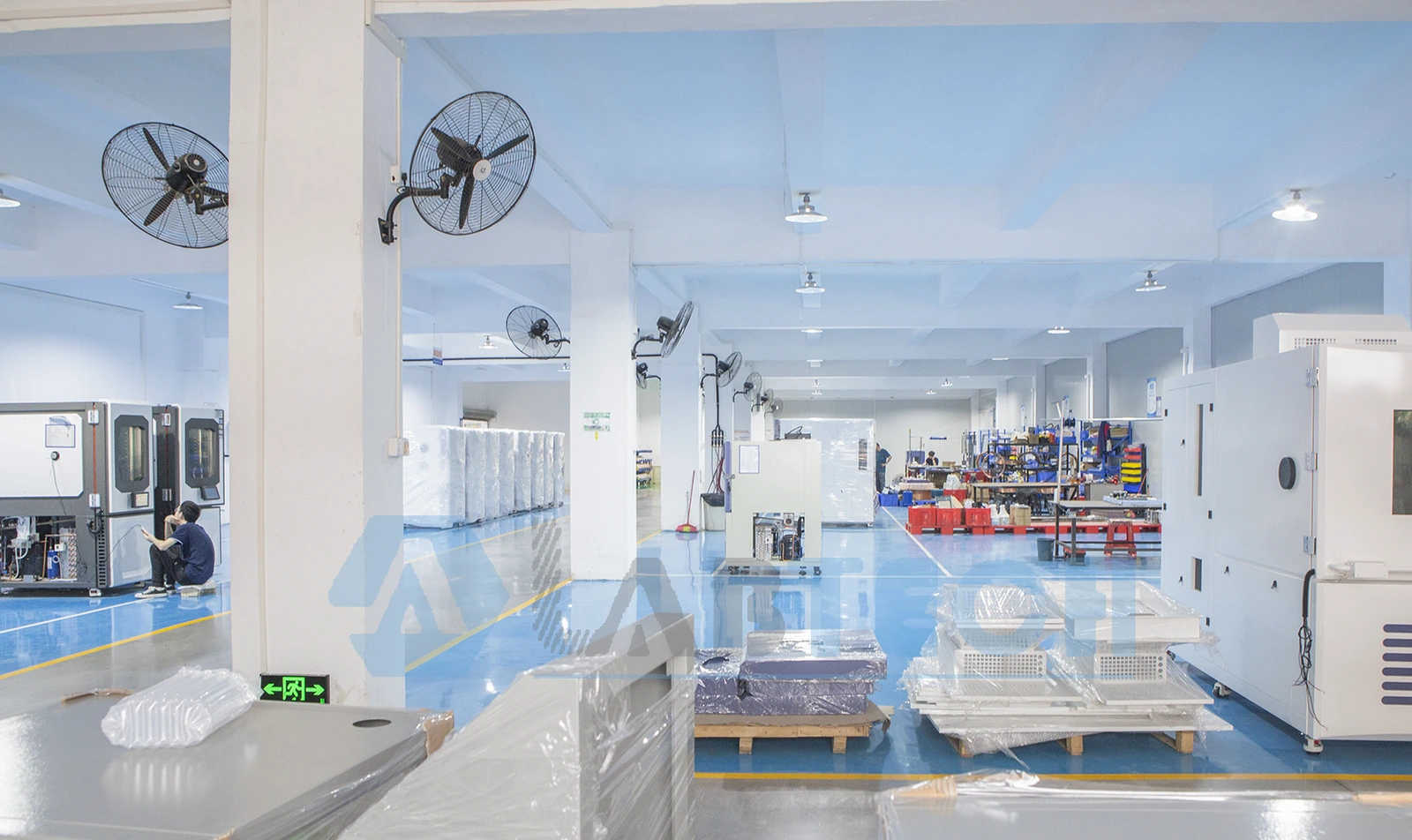 LABTECH equipment assembly workshop with test chambers, workbenches and packaged components